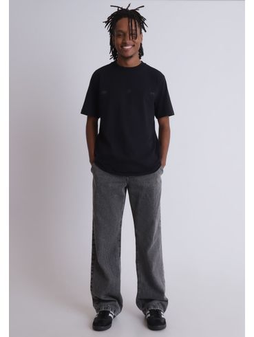 Calça jeans baggy com bolso faca