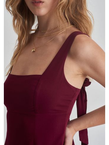Vestido amplo laço nas alças